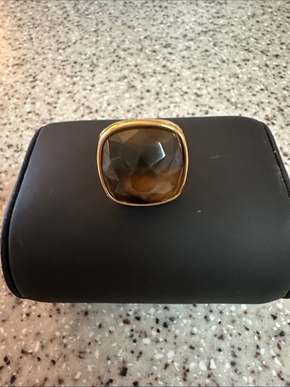 Fashion Ring. Gold tone with Brown topaz like setting.